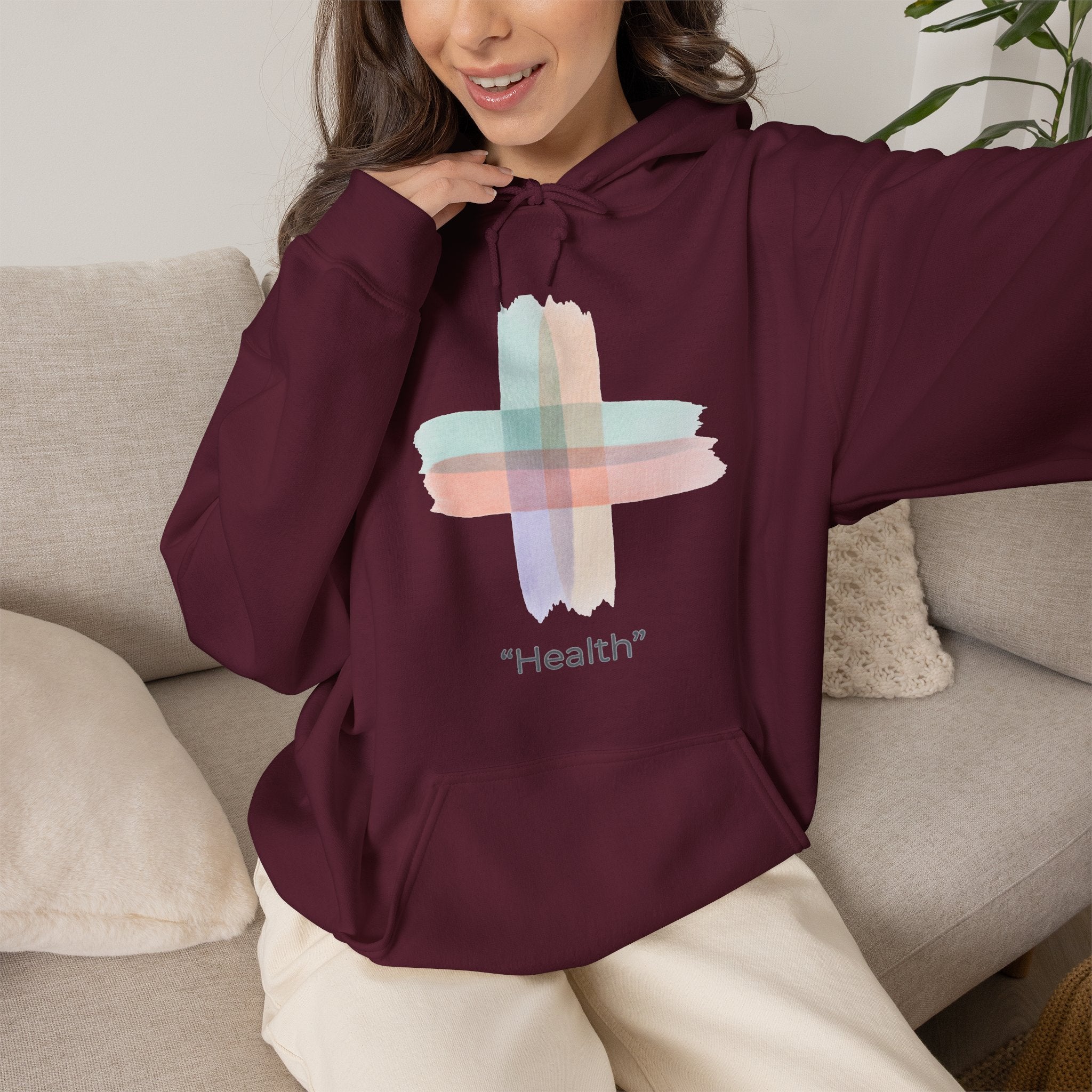 Health Symbol Hoodie – Minimal Pastel Cross & Leaf Wellness Graphic Hoodie