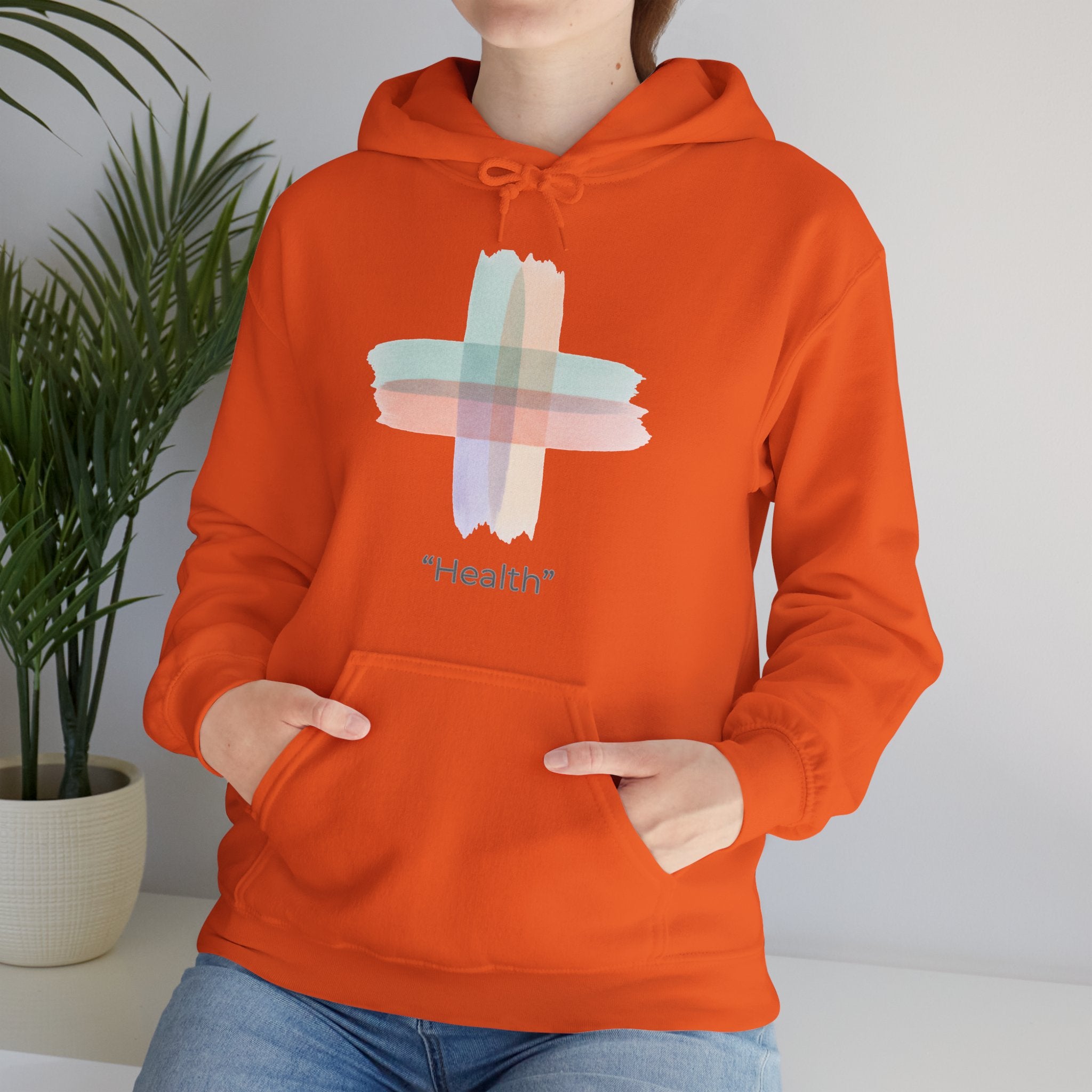 Health Symbol Hoodie – Minimal Pastel Cross & Leaf Wellness Graphic Hoodie
